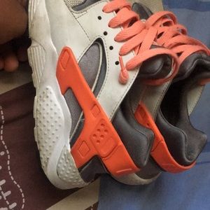 Pink pow Nike huaraches.